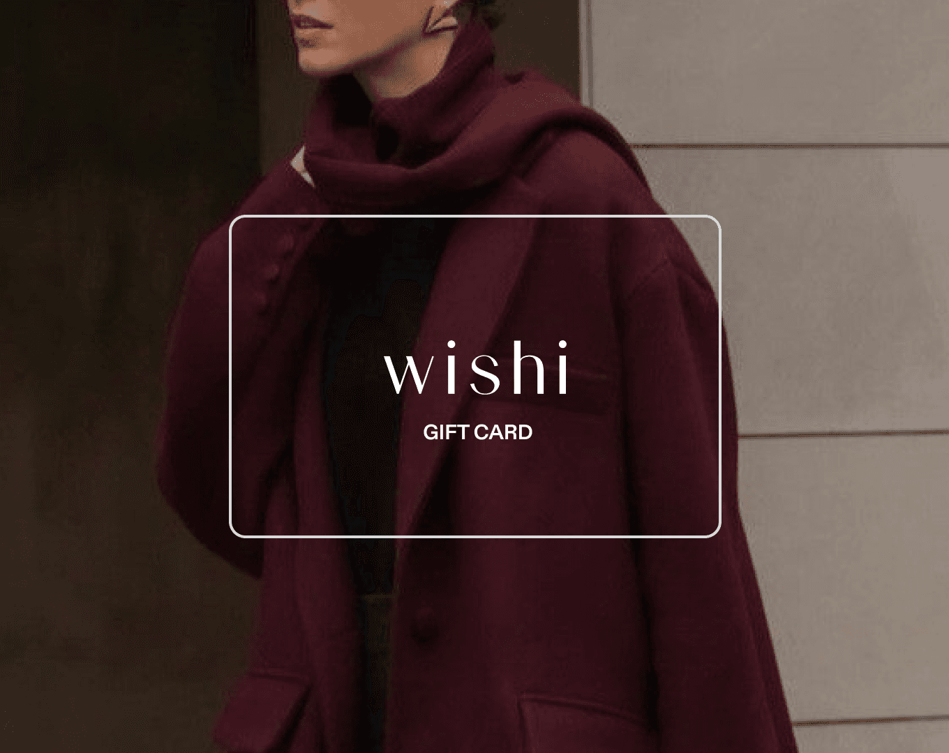 Wishi Gift Card on burgundy coat — corporate gifting